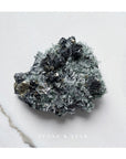 Tetrahedrite, Pyrite and Chlorite included Needle Quartz on a bed of Iridescent Mirror Galena